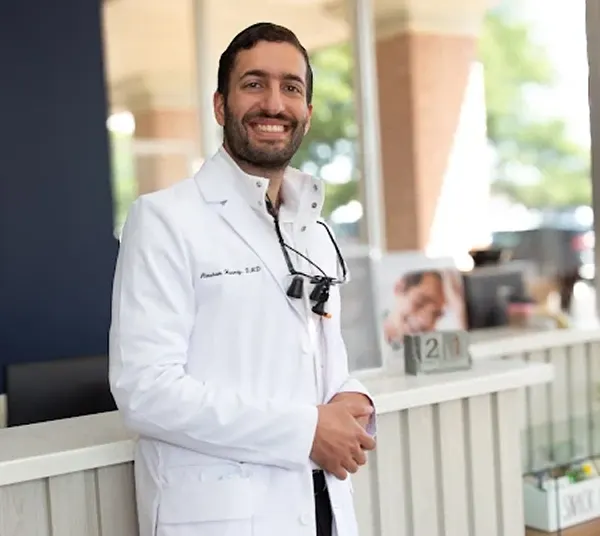 Dr. Abraham Y Husney at the front desk